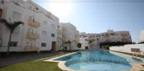 Appartement avec piscines, vue sur mer et accès à la plage à Achakar Hill, Tanger.